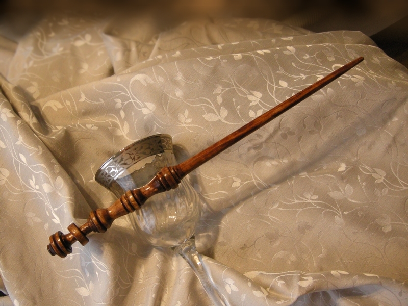 bacchetta magica con anello intrappolato